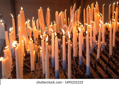 Lit Candles At The Marian Shrine In Lourdes, France