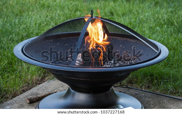 Lit Outdoor Firepit Cover Stock Photo Edit Now 1037227168