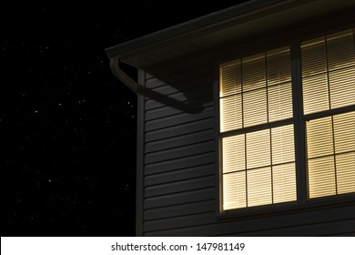 Lit Window Of Building Exterior At Night