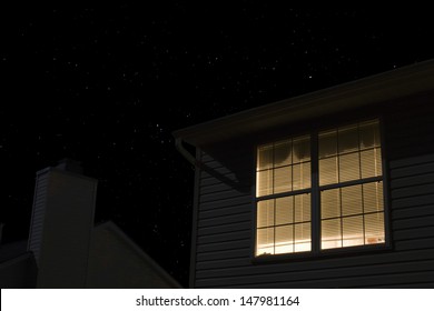 Lit Window Of Building Exterior At Night