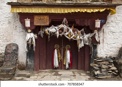 Litang China Aug 31 2016, Birthplace Of The Seventh Dali Lama Entrance With Devotional Items Translation: The Birth Place Of The Seventh Dali Lama