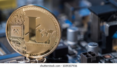 Litecoin crypto currency on a computer motherboard
