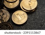 Litecoin cryptocurrency surrounded by various golden cryptocurrencies