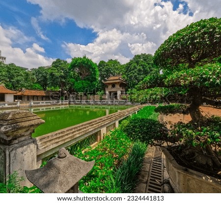 Literature Temple surrounded by beautiful gardens old historic buildings Bonsai plants and old trees in Hanoi Vietnam 