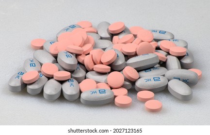 Lithium And Depakote Pills On A White Surface.