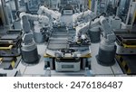 Lithium-Ion EV Battery Pack Assembly Process. Electric Car Manufacturing Inside Automotive Factory. Row of Industrial Robotic Arms at Automated Production Line at Bright Modern Factory. 