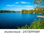 Lithuania, Beautiful lake water at trakai village near vilnius nature landscape with blue sky and sun in summer