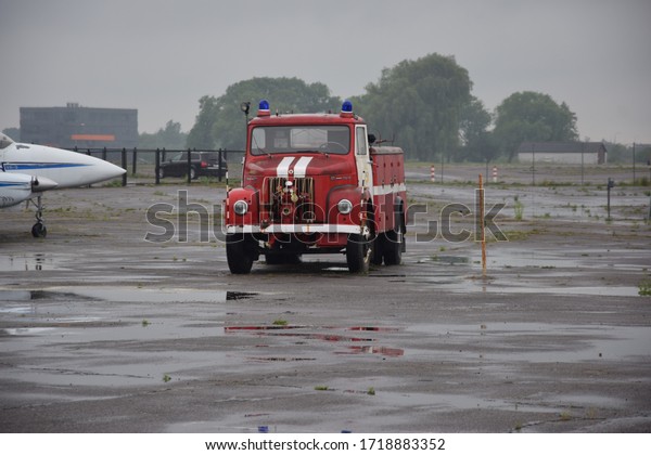 Lithuania/ Kaunas 2019 - 06 - 20\
Old school old-fashioned firetruck for fireman to fight\
flames.