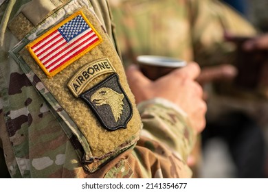 Lithuania - March 29 2022: Patch And Symbol Of NATO Force Integration Unit In Lithuania, Baltic States On A Soldier Uniform, During A Break Drinking Coffee On Sunset, Close Up