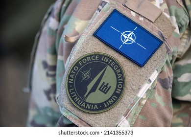 Lithuania - March 29 2022: Patch Flag And Symbol Of NATO Force Integration Unit In Lithuania, Baltic States On A Soldier Uniform, Close Up