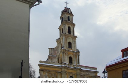 LITHUANIA, VILNIUS - JANUARY 30, 2019: A Walk In The City Center On A Warm Winter Day, An Old Baroque Church