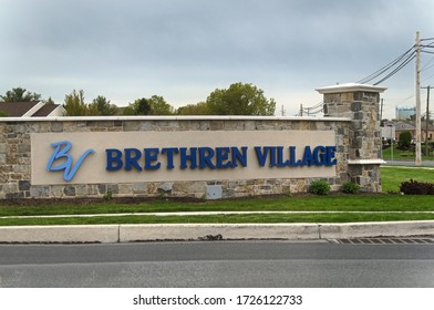 Lititz, Pennsylvania/United States - May 6 2020: Large New Sign For The Brethren Village Retirement Community, At The Lititz Pike And Airport Road Intersection