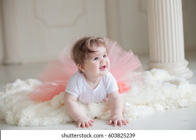 A Little Adorable Baby Girl In The Tutu Skirt