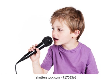 little adorable boy singing in a studio isolated