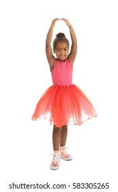Little African American ballerina on white background