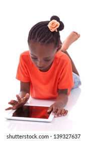 Little African American Girl Using A Tablet  Pc, Isolated On White Background