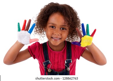 Little African Asian girl with hands painted in colorful paints