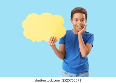 Little African-American boy with speech bubble on blue background - Powered by Shutterstock