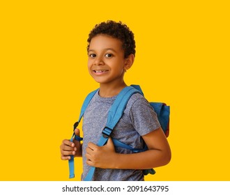 Little African-American schoolboy on color background - Shutterstock ID 2091643795