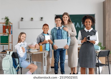 Little African-American schoolgirl with VR glasses in classroom - Powered by Shutterstock