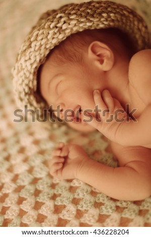 Similar – Image, Stock Photo Newborn baby with pompom hat sleeping and laughing on blanket