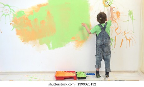 Little Artist Painting White Wall, Amusing Child Have Fun 