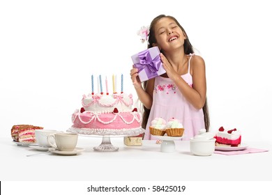 Little Asian beautiful girl celebrate her birthday, taking a present