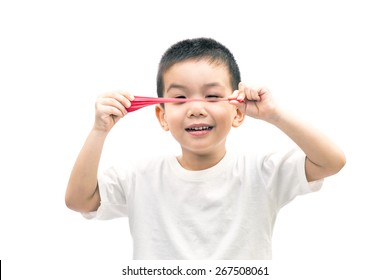 Little Asian Boy Stretch A Red Balloon Isolated On White Background