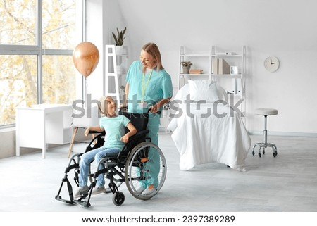 Similar – Caregiver with elderly patient in a wheelchair in front of window