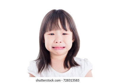 Little Asian Girl Crying Over White Background