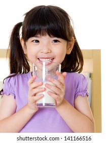 Little Asian Girl Drinking Milk