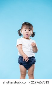 Little asian girl giving grimace face - Shutterstock ID 2197657813
