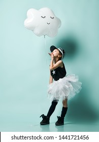 Little Asian Girl Kid In Fashion Skirt Hold Metallic Sleeping Cloud Balloon For Kids Birthday And Send A Kiss To The Sky On Blue Mint