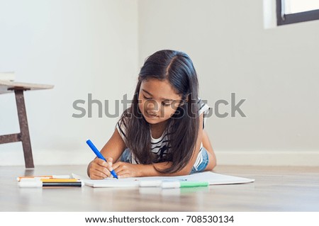 Similar – Foto Bild Mädchen mit bunt lackierten Fingernägeln, hält ein Eis in der Hand vor dem Mund.