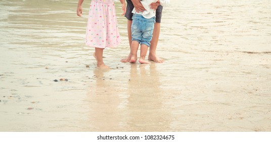 Little Asian Girl Playing On The Beach At Pattaya,thailand. Vaca