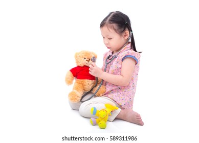 Little Asian Girl Pretend To Doctor Over White Background