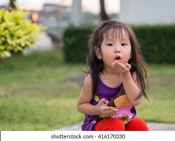 Little Asian Girl Sends Kiss