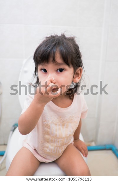 Little Asian Girl Sitting On Toilettraining Stock Photo Edit Now