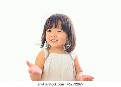 Little Asian Girl Smile On White Background.No Problem Concept.