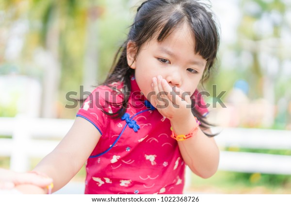 Asian Girl Vomiting