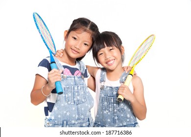 Little asian girls with badminton isolate on white background