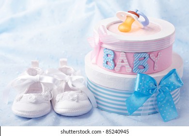 Little Baby Booties And Gift Boxes