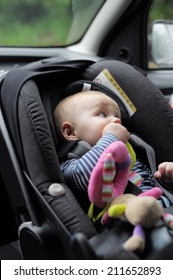 Little Baby Boy In Car Seat 