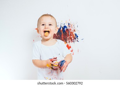 Little Baby Boy Covered In Paint For Painting