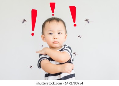 Little baby boy has allergies with mosquitoes bite or allergies medicine side effect and itching his hands and arms.Mosquito sucking blood on child skin.Malaria and Dengue virus from mosquito concept.