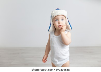 Little Baby Boy Posing In Winter Hat