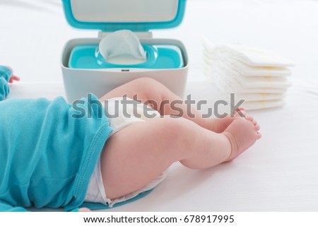 Little baby boy preparing for a diaper change