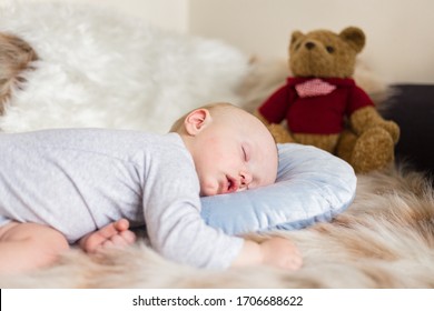 Little Baby Boy Sleeping On A Sofa On Artificial Fur