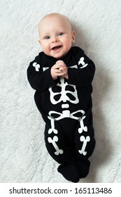 Little baby dressed funny skeleton