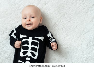 Little baby dressed funny skeleton
